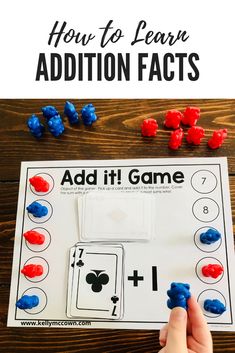 an addition game with red, white and blue gummy bears