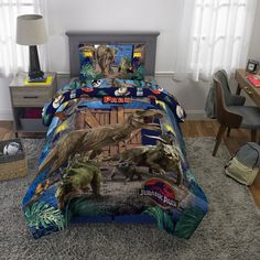 a bed with dinosaurs on it in a bedroom