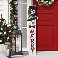 a decorated christmas door hanger in front of a red door with the words be merry written on it