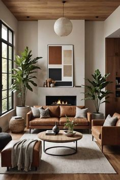 a living room filled with furniture and a fire place in the middle of the room