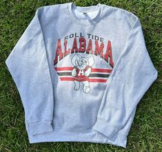 Alabama game day sweatshirt!  Gildan or jerzees brand! Brand depends on what I can get stock wise at the time! Both TTS very comfortable sweatshirts! Short sleeve is comfort color brand on the color pepper Alabama Pumpkin, University Red Cotton Sweatshirt For Game Day, Game Day Fleece Crew Sweatshirt, Alabama Grandma Shirt, Red Crew Neck T-shirt For Game Day, Alabama Game Day, Cute Alabama Sweatshirt, Alabama Hoodie