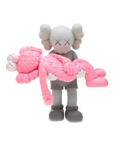 a pink teddy bear holding a stuffed animal