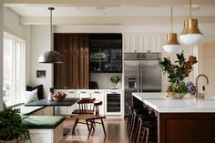 the kitchen is clean and ready to be used as a dining room or family room