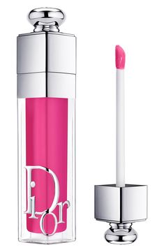 What it is: The iconic lip-plumping gloss gets a refresh with a new 90% natural-origin-ingredient formula, a reimagined case and updated shades.What it does: The formula features 90% natural-origin ingredients and is infused with cherry oil and hyaluronic acid. The plumping gloss smoothes and makes lips appear bigger, leaving them hydrated for up to 24 hours. It is now available in a new range of shiny shades with clear, intense, shimmering and holographic finishes. How to use: Apply the gloss d Dior Lip Addict, Dior Lipgloss, Applying Lipstick, Hydrated Lips, Dior Lip, Dior Addict Lip, Lip Primer, How To Apply Lipstick, Dior Addict