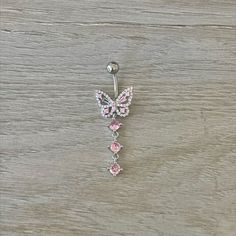 This dainty belly button ring has a gorgeous pink butterfly design, perfect for all belly/navel piercings! ♥ 316L Surgical Steel ♥ Cubic Zirconia Gems ♥ 10mm bar, 14G ♥ Externally Threaded #bellyring #bellyrings #bellybuttonring #bellybuttonrings #bellybuttonpiercing #bellypiercing #navelring #navelpiercing #bellybuttonjewelry #bellybuttonpiercings #cutebellyrings #etsysellersofpinterest #etsy #etsyseller #etsyshop #etsyjewelry #etsyfinds #etsystore #etsylove #etsysellers Navel Jewelry