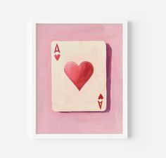 a card with two hearts on the front and one in the back, against a pink background