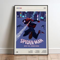 a spider man movie poster hanging on the wall