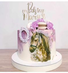 a decorated cake with a horse on it