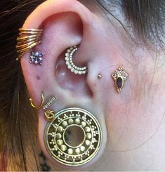 a woman with ear piercings on her ears