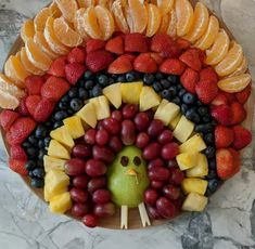 a turkey made out of fruit on top of a table