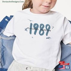 Kid Taylor 1989 Tv T-Shirt Swiftie Merch Youth Hoodie Sweatshirt Classic Check more at https://devianartdesigns.com/product/kid-taylor-1989-tv-t-shirt-swiftie-merch-youth-hoodie-sweatshirt-classic/ Swiftie Merch, 1989 Tv, Tv