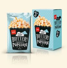 two bags of popcorn sitting next to each other