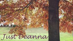 a tree with the words just deanna written on it in front of an autumn scene