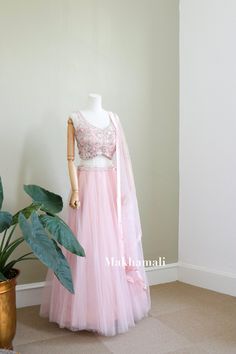 Beautiful puffy light pink lehenga set. Hand embroidery of sequins, Gardena and stone work on the blouse and skirt. It also has unique dupatta piece. length of the skirt is 42 inch and Length of blouse is 15 inch.It consists of hard net inside the skirt giving volume on the skirt. Size Guide: UK    8 10 12 14 USA 4  8  10 12 Euro 34 36 38 40 Pink Sleeveless Lehenga With Resham Embroidery, Sleeveless Pink Lehenga With Resham Embroidery, Sleeveless Pink Lehenga For Wedding, Pink Sleeveless Lehenga For Navratri, Pink Anarkali Sleeveless Choli, Sleeveless Embellished Pink Choli, Pink Sleeveless Embellished Choli, Pink Semi-stitched Sleeveless Choli, Semi-stitched Sleeveless Pink Choli