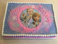 a birthday cake with frozen princess characters on it