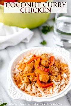 a white bowl filled with chicken and rice