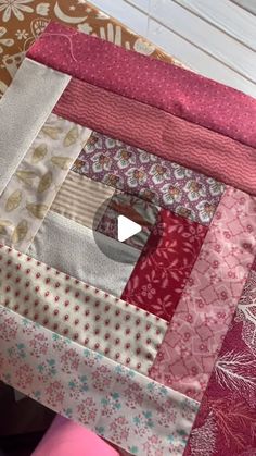 a close up of a patchwork quilt