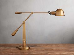 A modern take on a classic style, our Colson Task Table Lamp exudes functional beauty. Crafted from steel in a polished brass finish, Colson's simplistic design is complemented by subtle, decorative details creating an elevated lighting solution. Root Table, Handmade Chandelier, Arhaus Furniture, Tool Room, Bedside Lamps, Table Bedside, Wall Art Wallpaper, Contemporary Table Lamps, Contemporary Table