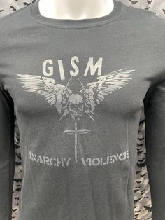 Gism Punk Long Sleeved Shirt. These are dark grey ink on a black long sleeve shirt. 100% CottonThese are handmade screenprinted and slightly vary from the photo. Please feel free to email me any questions. Thanks for looking.Due to an influx of incorrect addresses if a package is returned,  you must pay the shipping cost to resend the item to you. I do not do exchanges and I do not take returns unless the item is damaged. I thoroughly check each item before it is shipped out. Punk Long Sleeve T-shirt With Letter Print, Punk Style Long Sleeve T-shirt With Letter Print, Edgy Long Sleeve T-shirt With Screen Print, Emo Long Sleeve T-shirt For Streetwear, Long Sleeve Punk Graphic T-shirt, Long Sleeve Punk Tops With Graffiti Print, Punk Long Sleeve Tops With Graffiti Print, Gothic Long Sleeve Cotton T-shirt, Emo Long Sleeve Graphic T-shirt