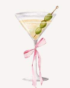 a painting of a martini with green olives on the rim and pink ribbon around it