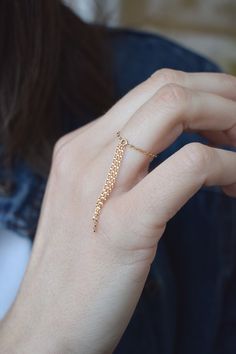 Chain dangle ring. Stacking fringe ring. Modern dainty and skinny ring with dangles. __ g o l d e n __ t h r e a d __ r i n g __ <3 ♥ This delicate piece is handmade with 14k yellow gold filled chain and a tiny jump ring. You can wear it as a standalone or stackable ring. ♥ You can select your size from the drop-down menu. The length includes the chain and the jump ring. ♥ All pieces are handmade to order. I can make a piece that will satisfy your imagination, a personalized piece that will b Delicate Adjustable Yellow Gold Chain Ring, Delicate Yellow Gold Adjustable Chain Ring, Delicate 14k Gold Chain Ring With Adjustable Chain, Delicate 14k Gold Adjustable Chain Ring, Dangle Ring, Dainty Style, Chain Rings, Chain Fringe, Rolo Chain