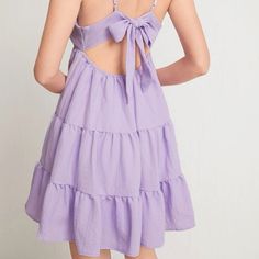 Lavender Tie Back Dress Never Worn Make Me An Offer! (: Length 35 In Bust 38.6 Waist 32.3 Hip 95.5 Casual Lavender Mini Dress For Brunch, Lavender Mini Length Dress For Day Out, Lavender Casual Mini Dress For Brunch, Purple Tie Back Mini Dress, Purple Tie-back Mini Dress, Spring Purple Sundress With Ruffles, Purple Sleeveless Sundress For Brunch, Purple Sleeveless Dress For Brunch, Purple Mini Dress With Tie Back