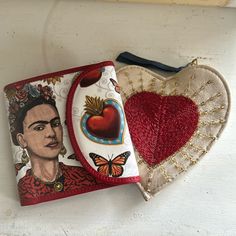 two heart shaped purses with fridace designs on them, one has an image of fridace