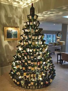 a wine bottle christmas tree in the middle of a living room