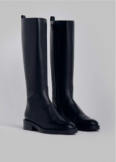 Our new riding boot made in classic smooth calfskin. Easy to slip on, side invisible zipper with leather tab. Round toe. Leather sole with anti-slip rubber padding. Details 100% Leather 0029MAR-BLA Made in Italy Heel Height = 2" (49mm) True to size Shoe Aesthetics, Classy Boots, Round Toe Boots, Riding Boots Fashion, Black Leather Riding Boots, Boots Ideas, Black Riding Boots, Tall Riding Boots, Black Knee High Boots