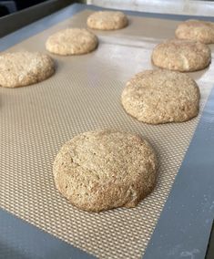 freshly baked cookies on a cookie sheet ready to be baked in the oven for consumption