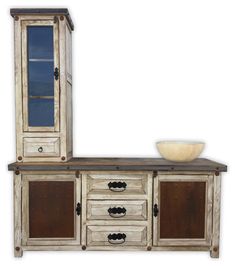 an old wooden cabinet with drawers and a bowl on the counter top next to it