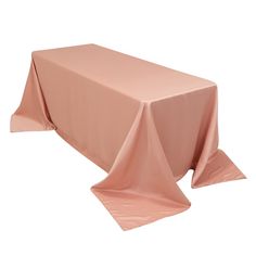 a pink tablecloth on a white background