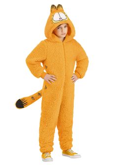 a little boy in a garfield costume