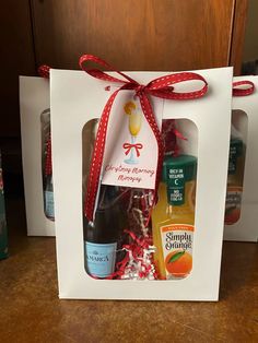 two bottles of alcohol in a gift bag