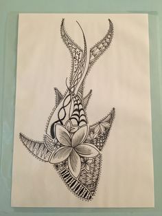 an ink drawing of a flower on paper