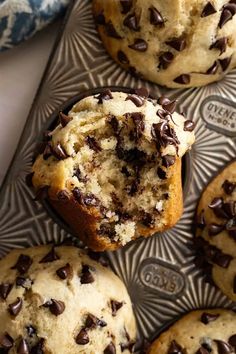 several chocolate chip muffins on a metal tray