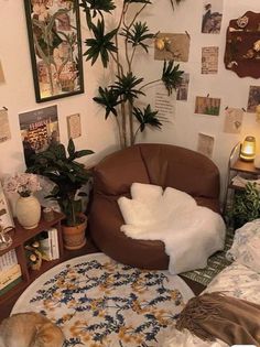 a living room filled with lots of plants and furniture