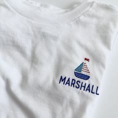 So adorable! Each name will be stitched below a mini sailboat. These are embroidered on Bella canvas short sleeve tees which are made of 100% cotton. Available in both bodysuits and tees. If you are wanting a different design, more wording, or a different clothing style, please send me a message so we can discuss the details. Embroidered Cotton Crew T-shirt, Crew Cotton T-shirt With Embroidered Logo, Cotton Crew T-shirt With Embroidered Text, Nautical Cotton T-shirt For Sailing, Crew Cotton Top With Machine Embroidery, Cotton Crew Top With Machine Embroidery, Nautical Cotton Tops For Boating, Cotton Crew Neck Top With Machine Embroidery, Nautical Cotton Top For Boating