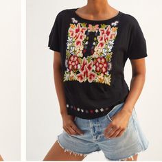 Artfully Embroidered With A Vibrant Floral Motif, This Top Delivers A Hearts And Crafts Touch To Any Summer Ensemble. Cotton, Rayon Embroidered Detail Pullover Styling Hand Wash Standard: 21.5"L Casual Black Top With Embroidered Hem, Black Cotton Top With Geometric Embroidery, Black Casual Top With Geometric Embroidery, Casual Black Tops With Geometric Embroidery, Spring Black Top With Geometric Embroidery, Spring Black Tops With Geometric Embroidery, Bohemian Tops With Tonal Embroidery For Summer, Black Top With Geometric Embroidery For Spring, Black Cotton Folk Embroidered Top