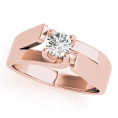 a rose gold ring with a diamond in the center