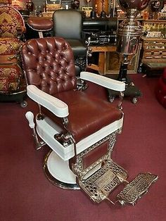 an antique barber chair in the middle of a store