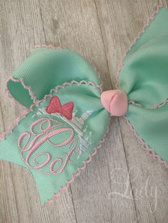 This listing is for 1 hairbow made with moonstitch ribbon with princess Castle monogram.  pictured is a 5 inch hairbow , ribbon color is lucite green/pink.  This bow can be customized,just add any changes in the personalization section. Disney Hair Bows, Southern Baby, Disney Hair, Personalized Bow, Bows For Girls, Custom Bows, Baby Bow Headband, Princess Castle, Sewing Lessons