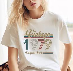 "45th Birthday Shirt,Vintage 1979 Shirt,45th Birthday Gift For Women,45th Birthday Gift For Men,45th Birthday Best Friend,45th BirthdayWoman# Please Check All Photos For Details.   🐞Choose Your T-Shirt Size From The Drop-Down Lists Next To The item Picture   ⭐Choose Of Your T-Shirt Color From The 2nd Picture   🐞Use \"Add message to Seller\" link On The Checkout Page To Send me the Following important Details For Your Order's Customization.   ⭐Shipping Time Varies by location (we are located in Sugar Land, Texas) please consider that our turn around time is 1 to 3 business days.     ⭐Which brand do you use for t-shirts? We use Gildan Softstyle, Bella Canvas Unisex, Hanes, Outlash, Tees,  District and Next Level when we have a shortage of stocks for certain colors and sizes. Our printing m 29th Birthday Gifts, 59th Birthday, Sugar Land Texas, 25th Birthday Gifts, 34th Birthday, Birthday Best Friend, 33rd Birthday, Birthday Gift For Women, Sugar Land