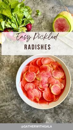 a bowl filled with radishes on top of a table next to other vegetables