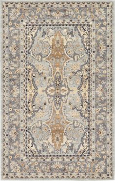 a rug with an ornate design on the front and back side, in grey tones