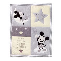 a mickey mouse wall hanging with stars and a star on the side, which says reach for the stars