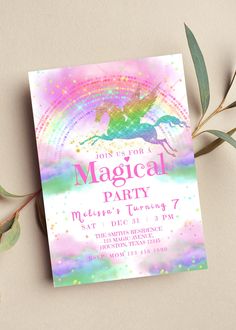 a unicorn themed birthday party with pink, green and blue colors on the back side