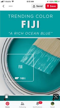 a blue paint can with a brush on it and the words, trending color fiji