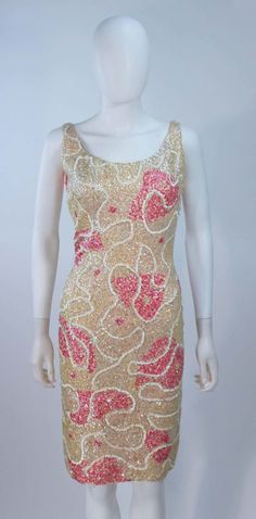 For Sale on 1stDibs - This Gene Shelly's cocktail dress is composed of a stretch knit wool with pink and iridescent sequin applique. There is a center back zipper closure. Iridescent Sequin, Sequin Appliques, Sleeveless Formal Dress, Evening Dresses, Sequin, Cocktail Dress, Formal Dresses, Boutique, Zipper