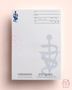 a medical record book sitting on top of a pink surface